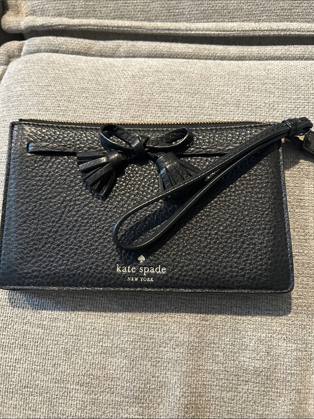 kate spade Black Pebbled Leather Tassel Wristlet